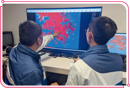 Staff members of OFCA using radio propagation simulation software to conduct television signal coverage assessment.